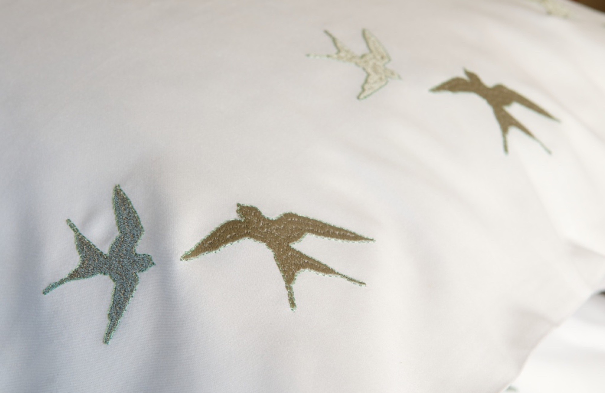 swallows-embroidered-bed-linen-gilly-nicolson