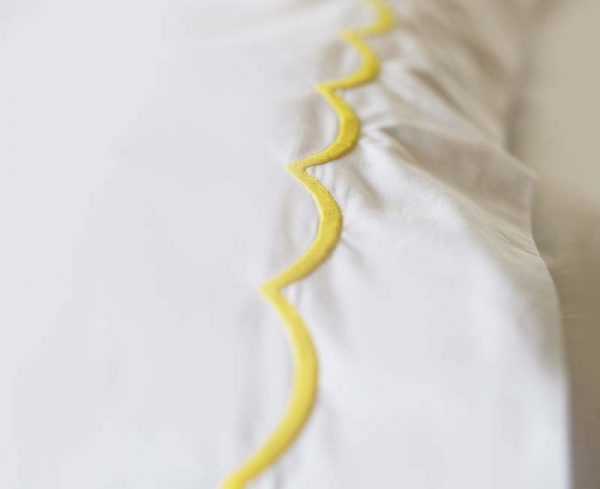 Cascais scallop bed linen with close up detail